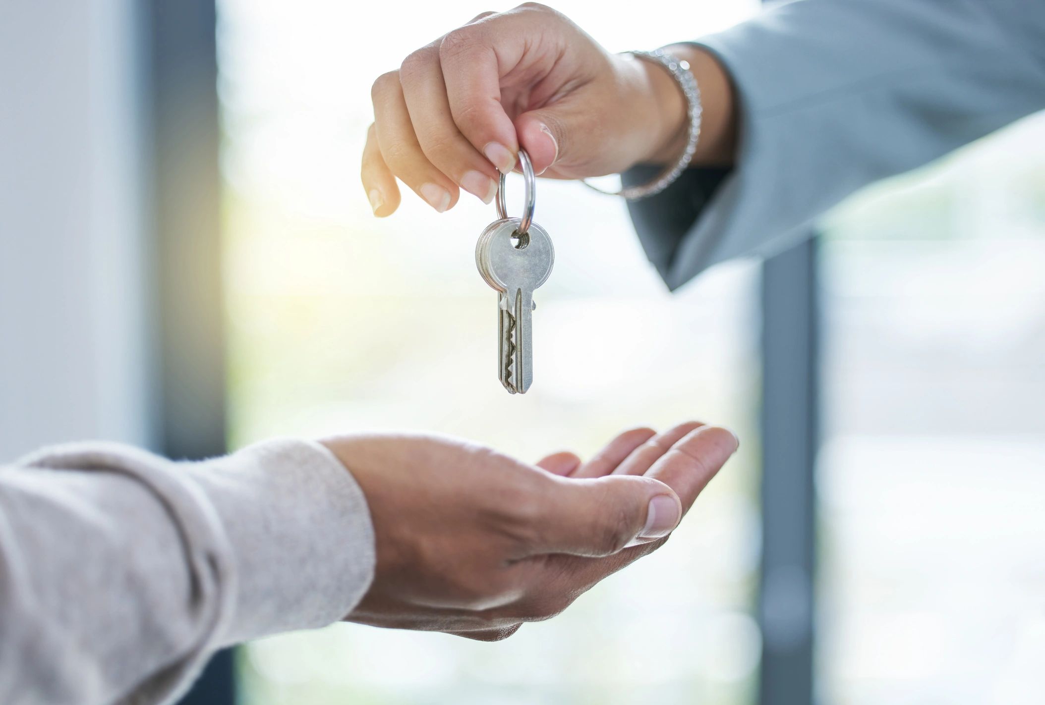 keys to a new homeowner who bought a house